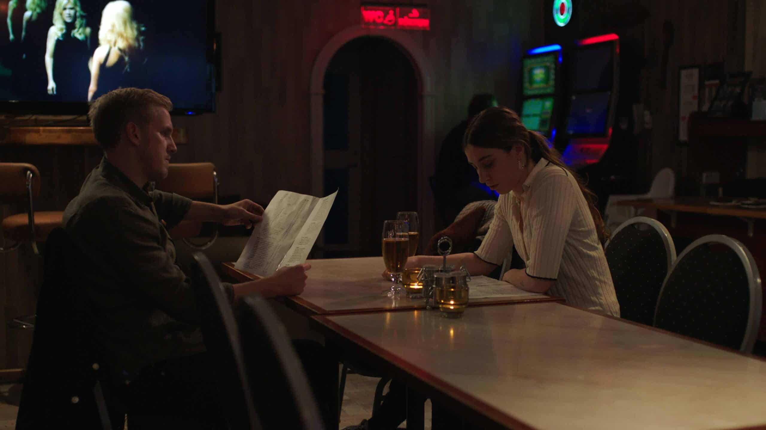Madeleine Martin and Joel Odmann in Alive (2020)